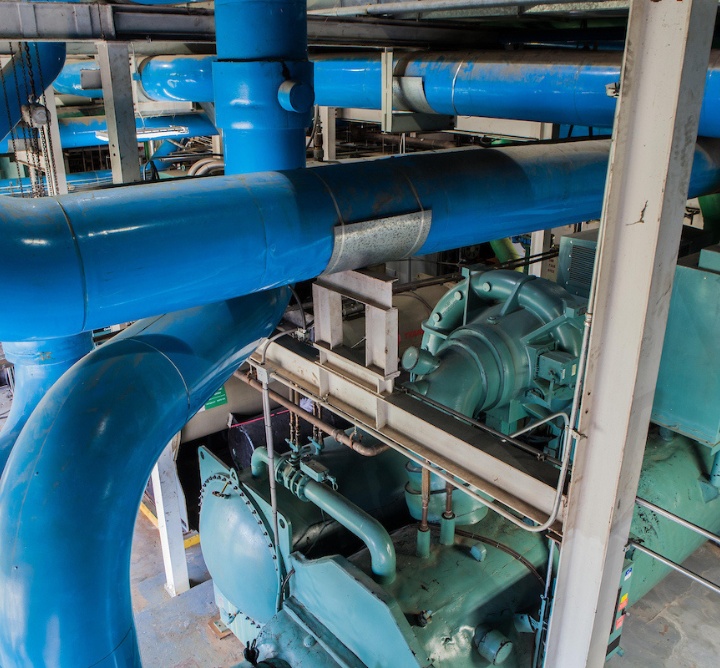 Chilled water pipes on an industrial HVAC machine.